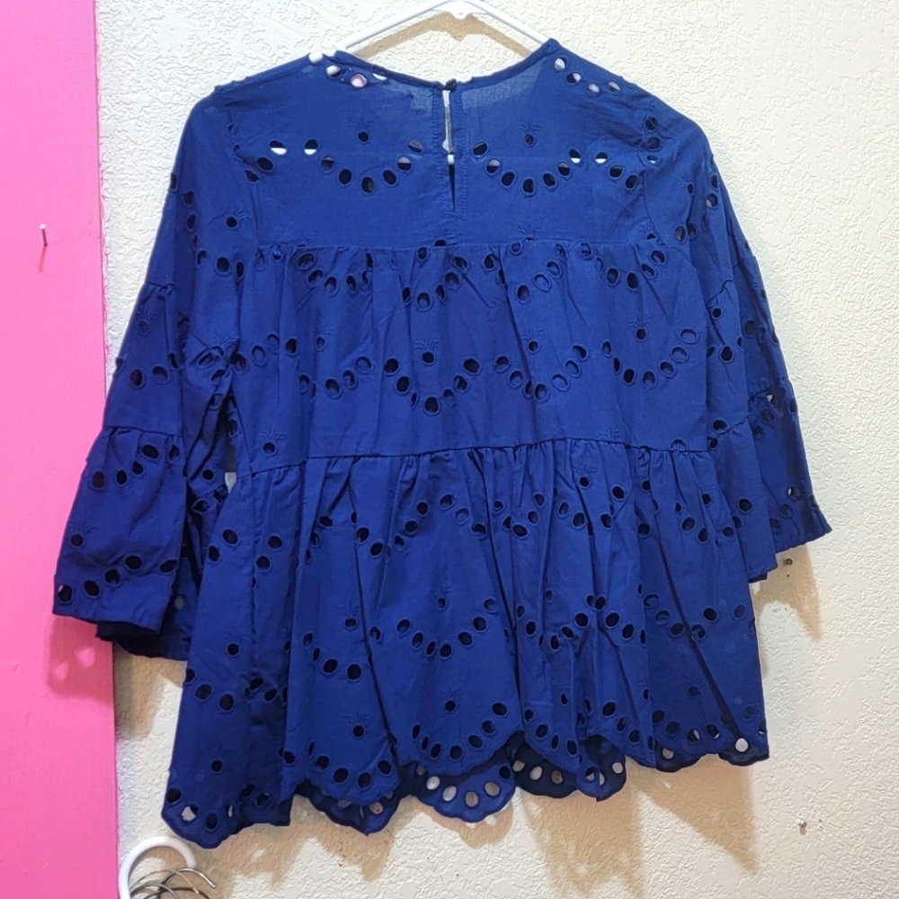 Simply Southern Women's Flowy Eyelet Shirt with Ruffled Edge.